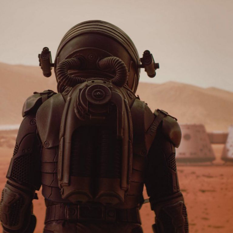 Back,View,Of,Astronaut,Wearing,Space,Suit,Walking,On,A