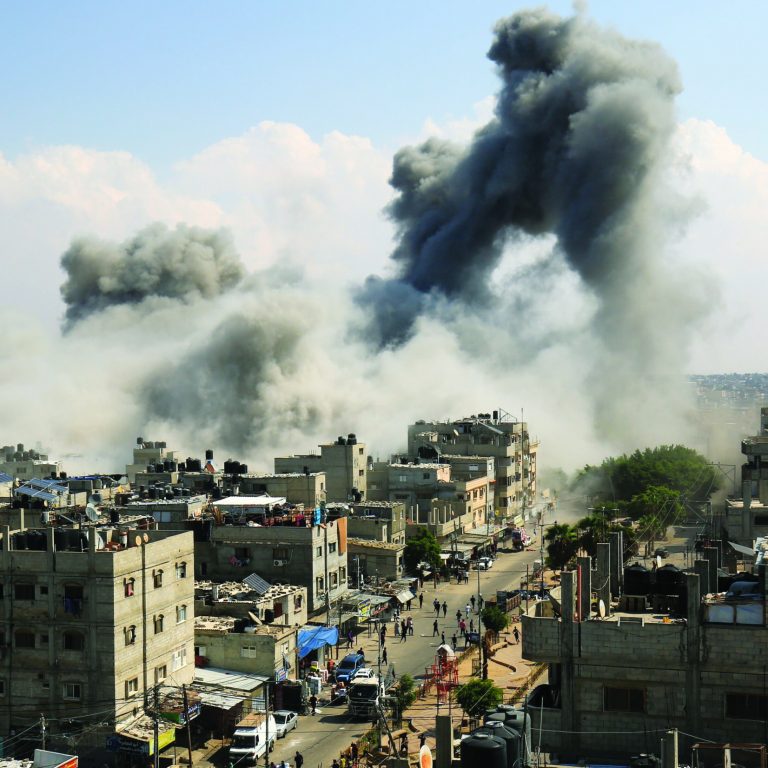 Smoke rises after Israeli air strikes of the city of Rafah in the southern Gaza Strip, October 10, 2023.